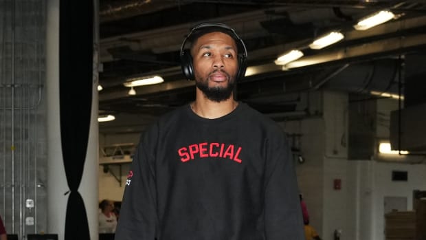 Milwaukee Bucks guard Damian Lillard arrives prior to the game against the Miami Hea